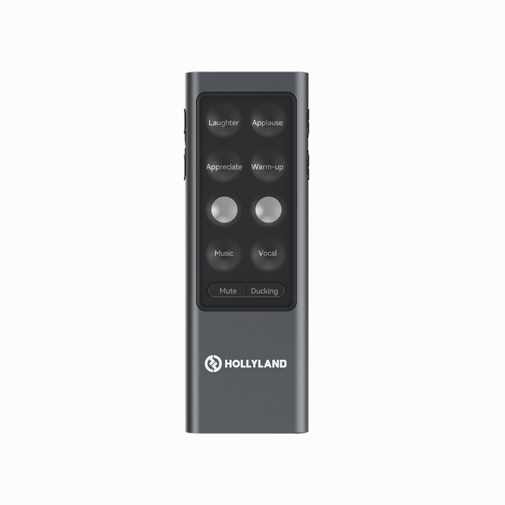 A gray Hollyland vocal trainer remote control with a black front panel featuring buttons for laughter, applause, warm-up, music, vocal, mute, and ducking.